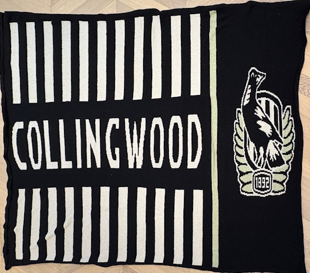 Large, hand-knitted rug/blanket