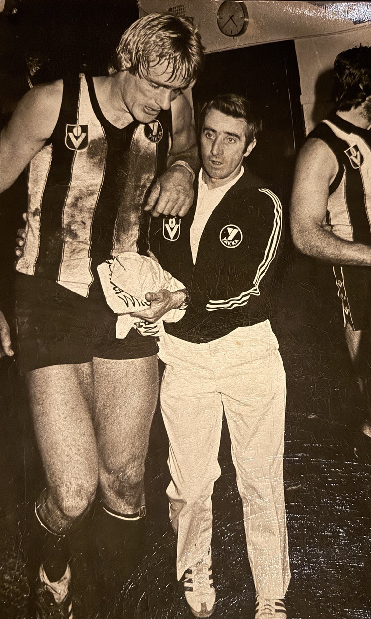 Helping Peter Moore post-match